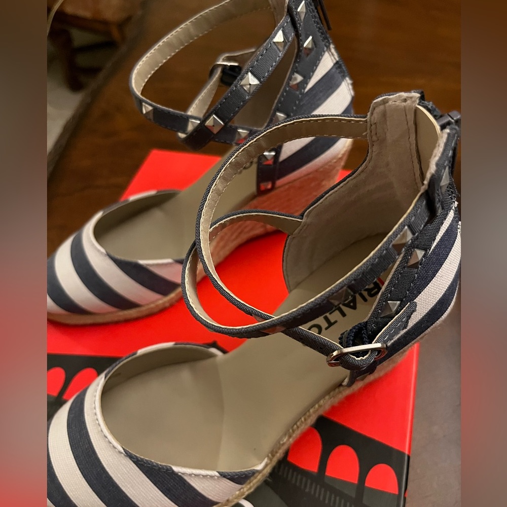 Brand new, never worn, 3 inch wedge, closed toe espadrille. Navy stripe.
